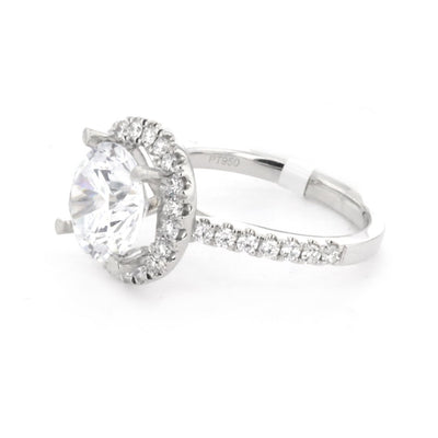 0.63 ctw Diamond Halo Engagement Ring