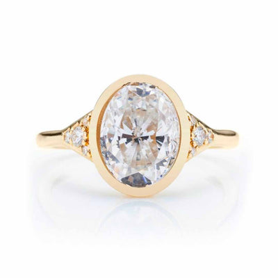 0.10 ctw Diamond Bezel Engagement Ring