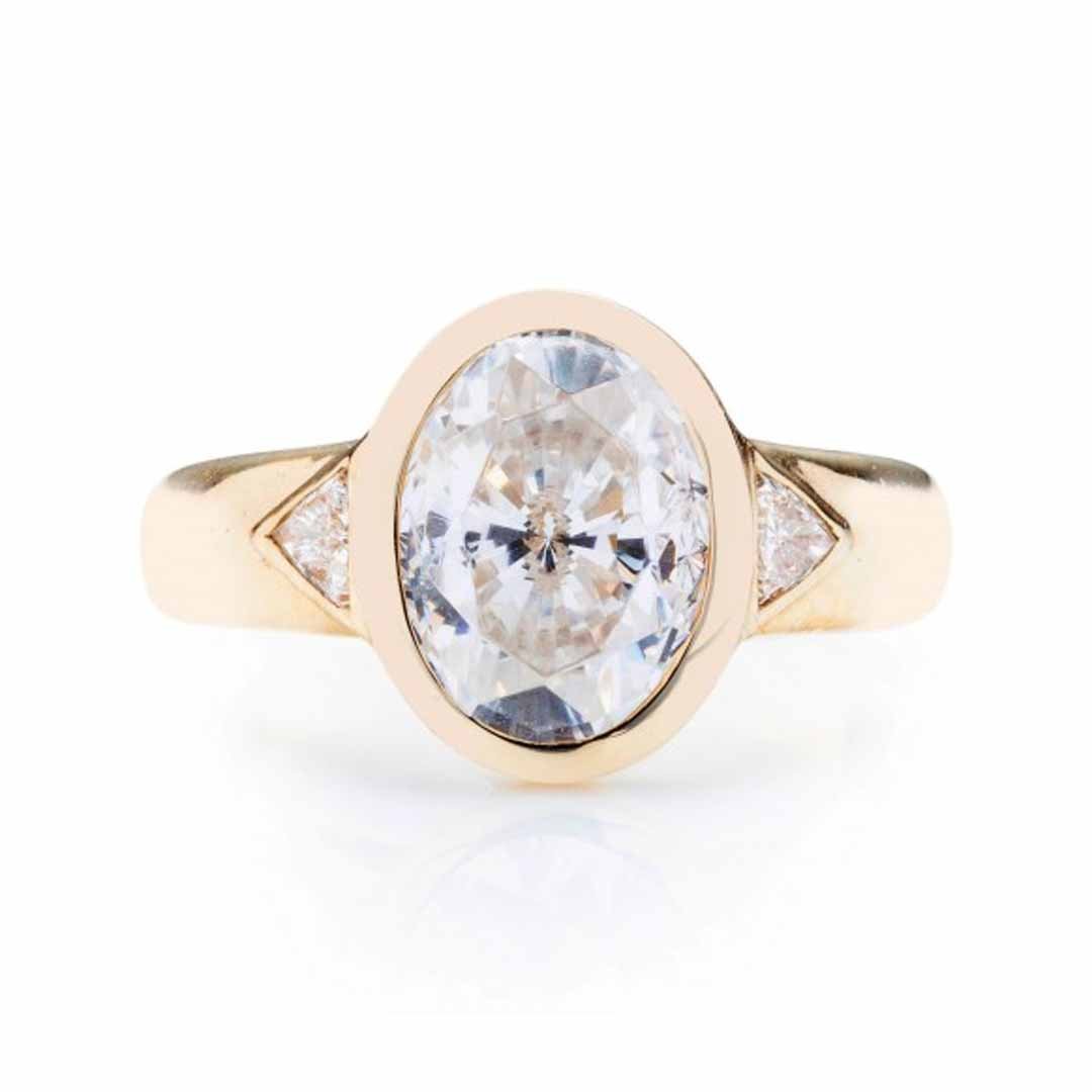 0.13 ctw Diamond Bezel Engagement Ring