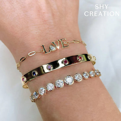 0.12 ctw Diamond "Love" Bracelet