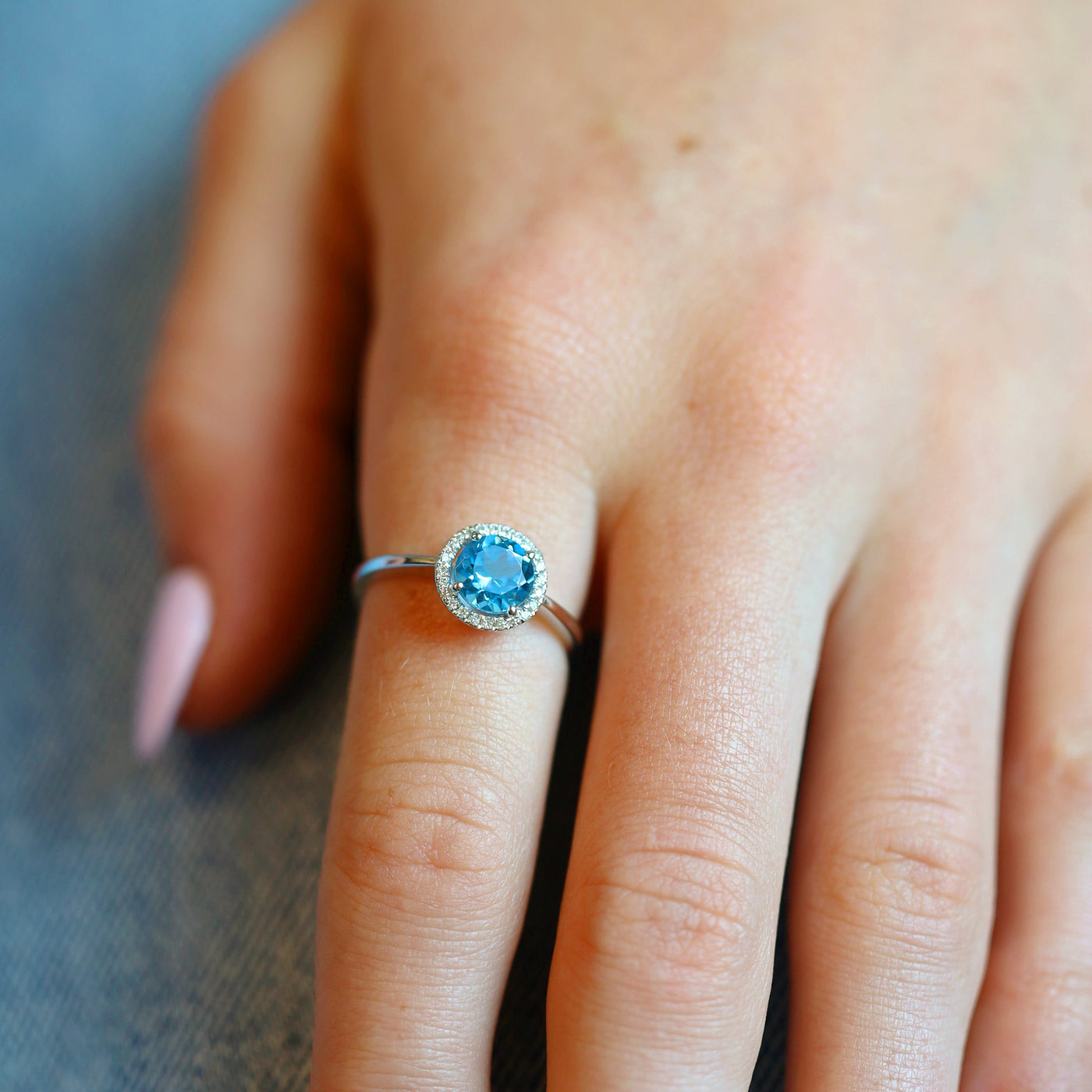 Blue Topaz & Diamond Halo Ring