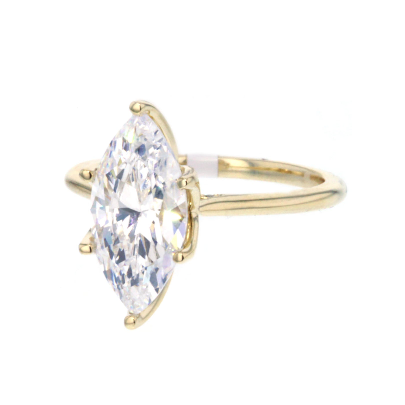 0.04 ctw Diamond Solitaire Engagement Ring
