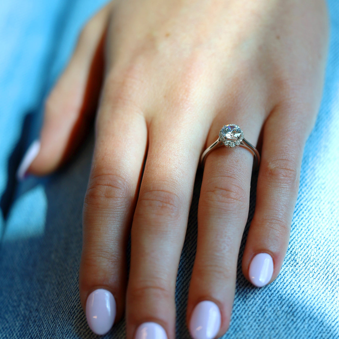 0.15 ctw Diamond Halo Engagement Ring