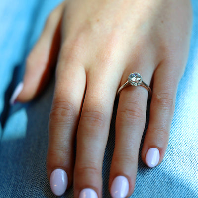 0.15 ctw Diamond Halo Engagement Ring