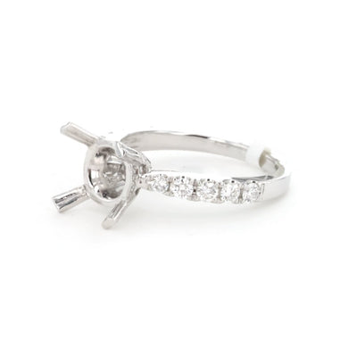 0.55 ctw Diamond Halo Engagement Ring