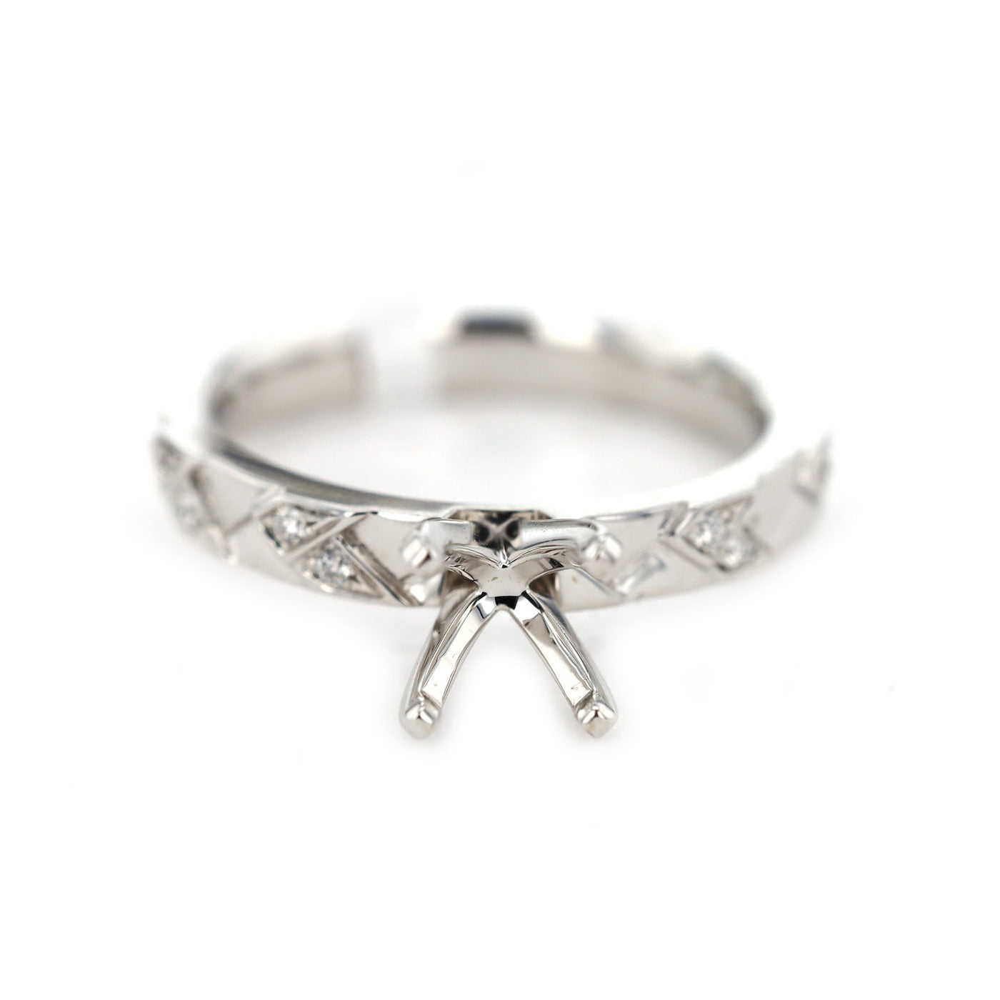 0.06 ctw Diamond Solitaire Engagement Ring