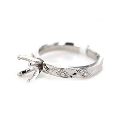 0.06 ctw Diamond Solitaire Engagement Ring