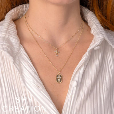 0.21 ctw Diamond Oval Cross Necklace