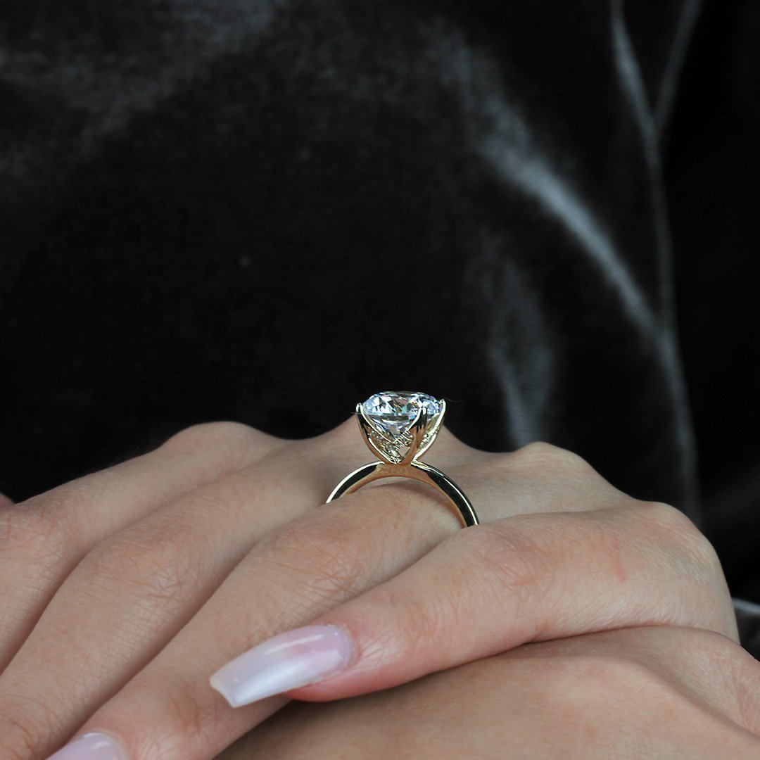 0.07 ctw Diamond Solitaire Engagement Ring