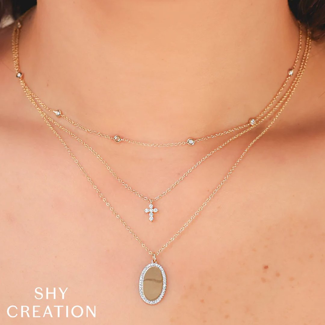 15+3" 0.11 ctw Diamond Oval Halo Necklace