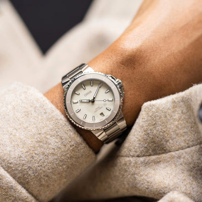 36.5MM Aquis Date