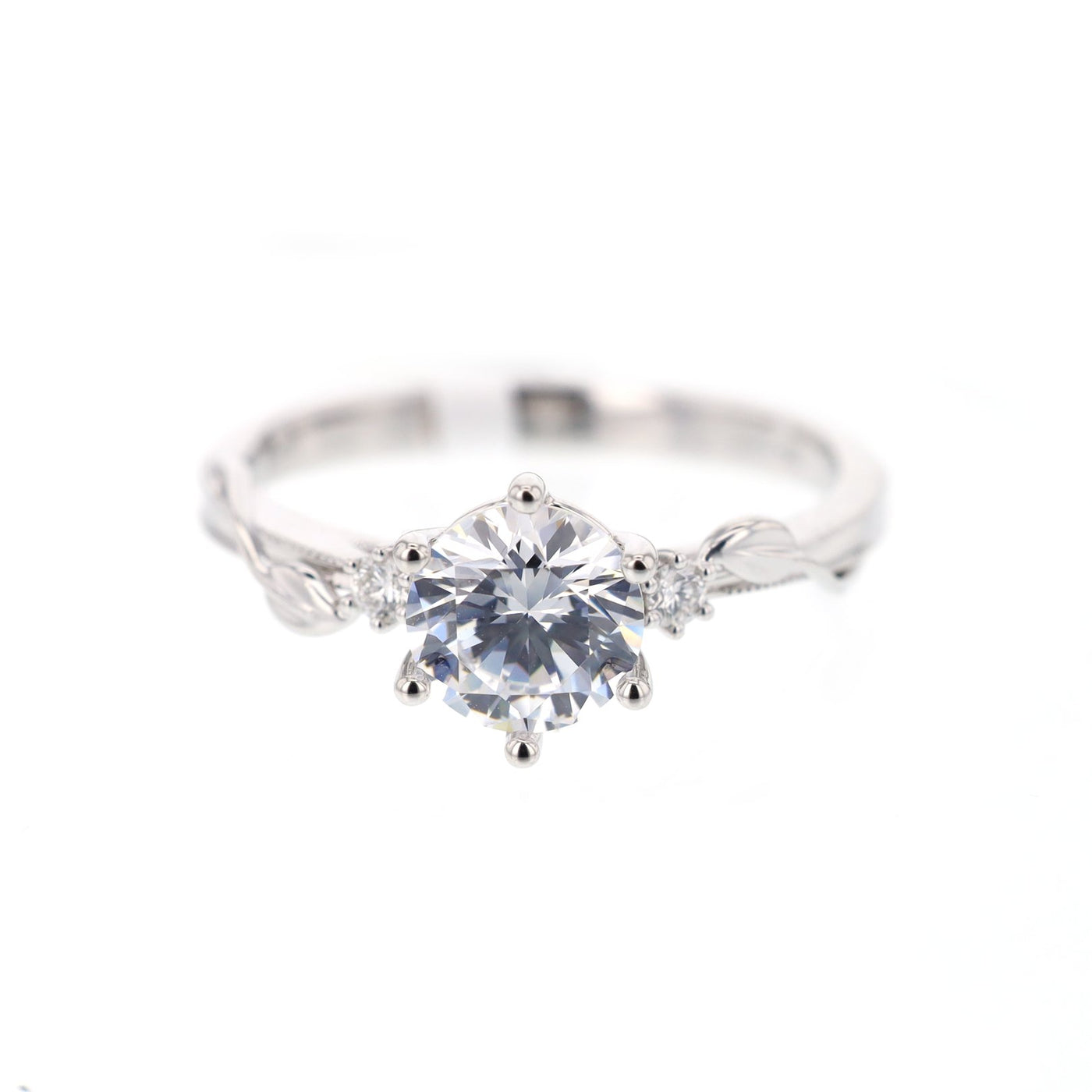 0.06 ctw Diamond Solitaire Engagement RIng