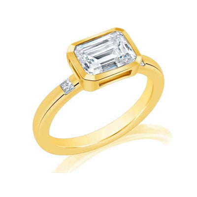 0.07 ctw Diamond Bezel Engagement Ring