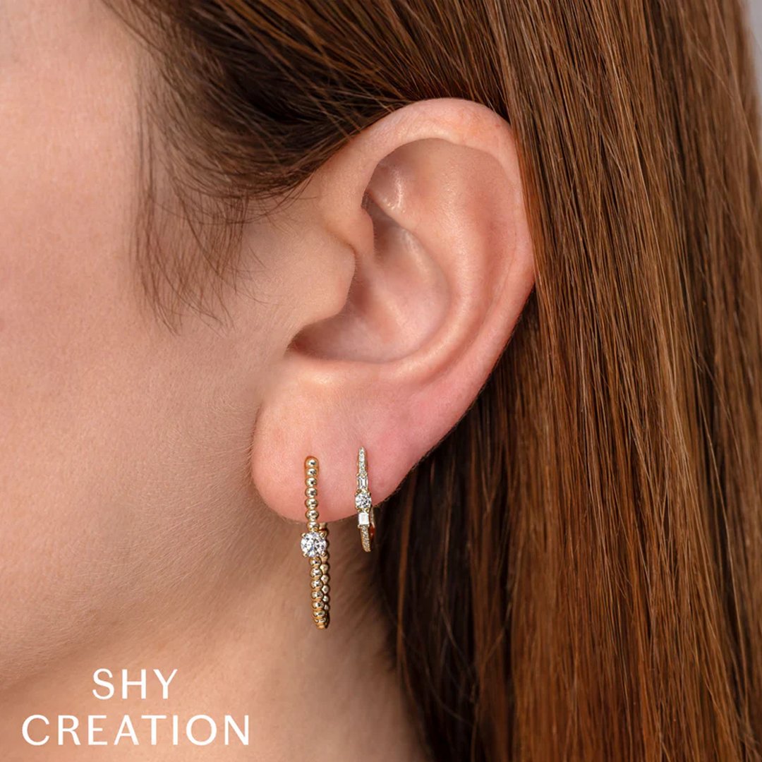 0.28 ctw Diamond Oval Hoop Earrings