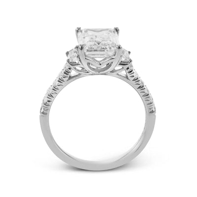0.64 ctw Diamond Three-Stone Engagement Ring