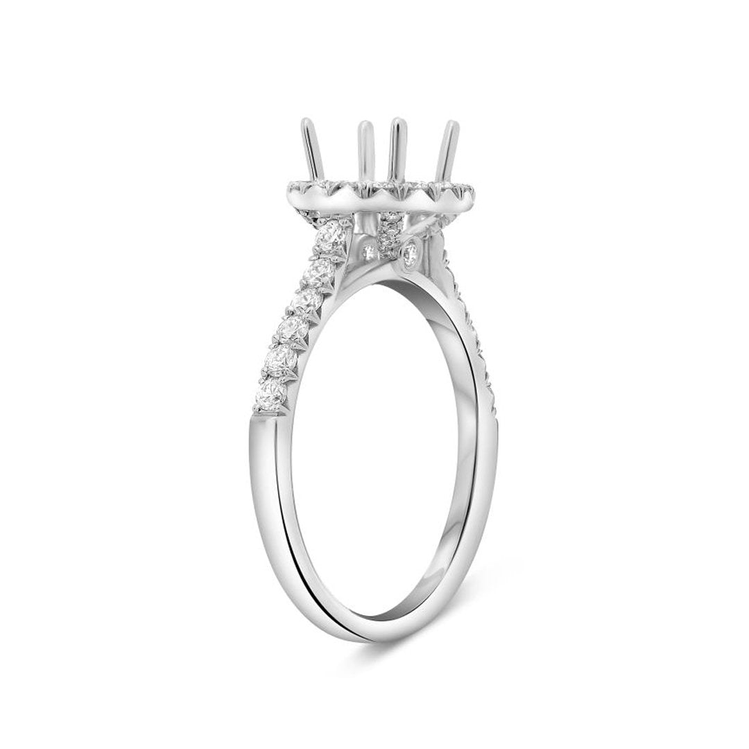 0.55 ctw Diamond Halo Engagement Ring - Continental Diamond