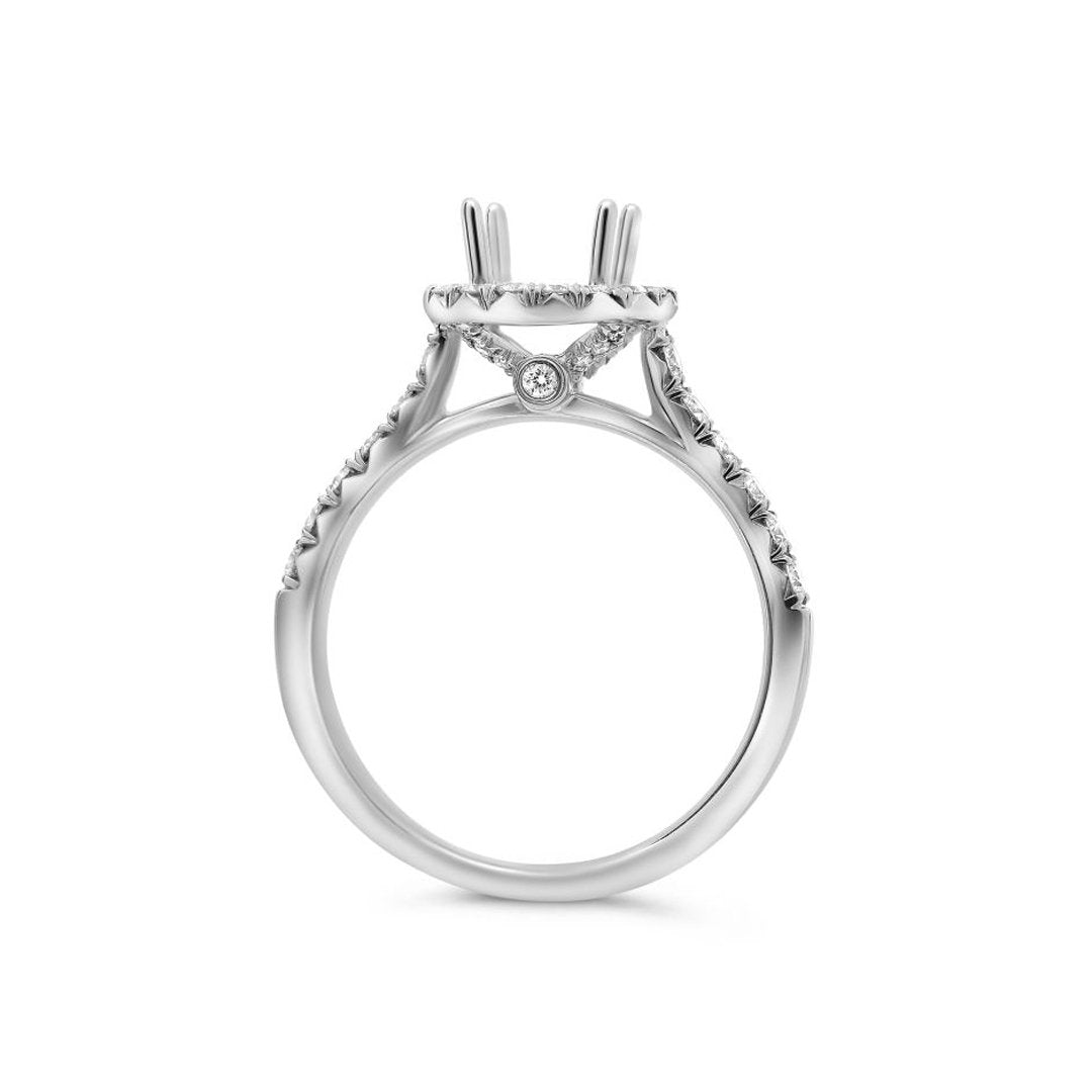 0.55 ctw Diamond Halo Engagement Ring - Continental Diamond