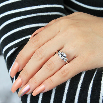 0.34 ctw Diamond Three-Stone Engagement Ring - Continental Diamond