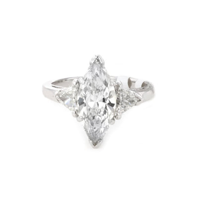 0.62 ctw Diamond Three-Stone Engagement Ring - Continental Diamond