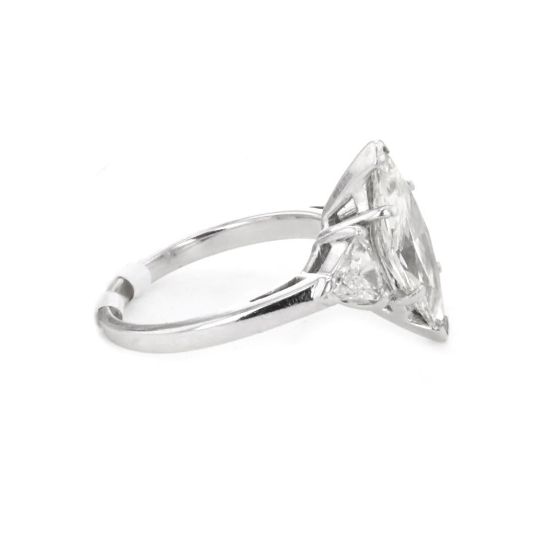 0.62 ctw Diamond Three-Stone Engagement Ring - Continental Diamond