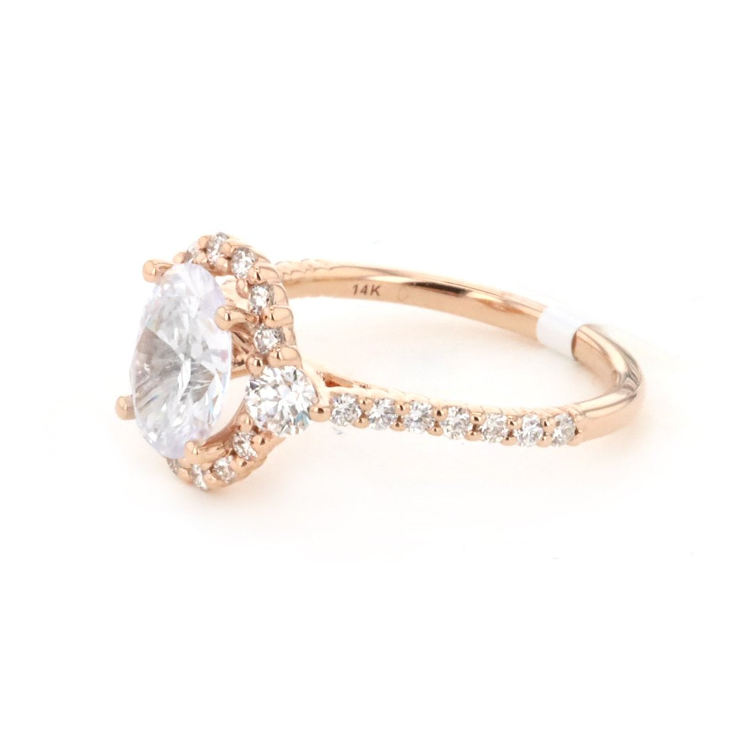 0.69 ctw Diamond Halo Engagement Ring - Continental Diamond