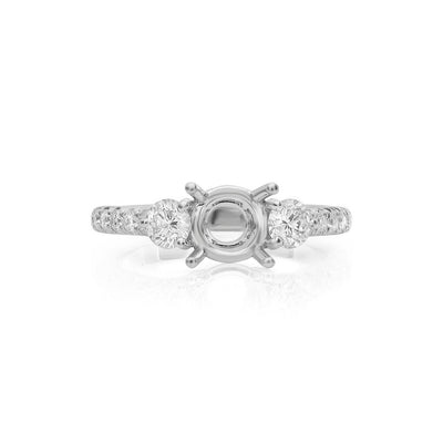 0.68 ctw Diamond Three-Stone Engagement Ring - Continental Diamond