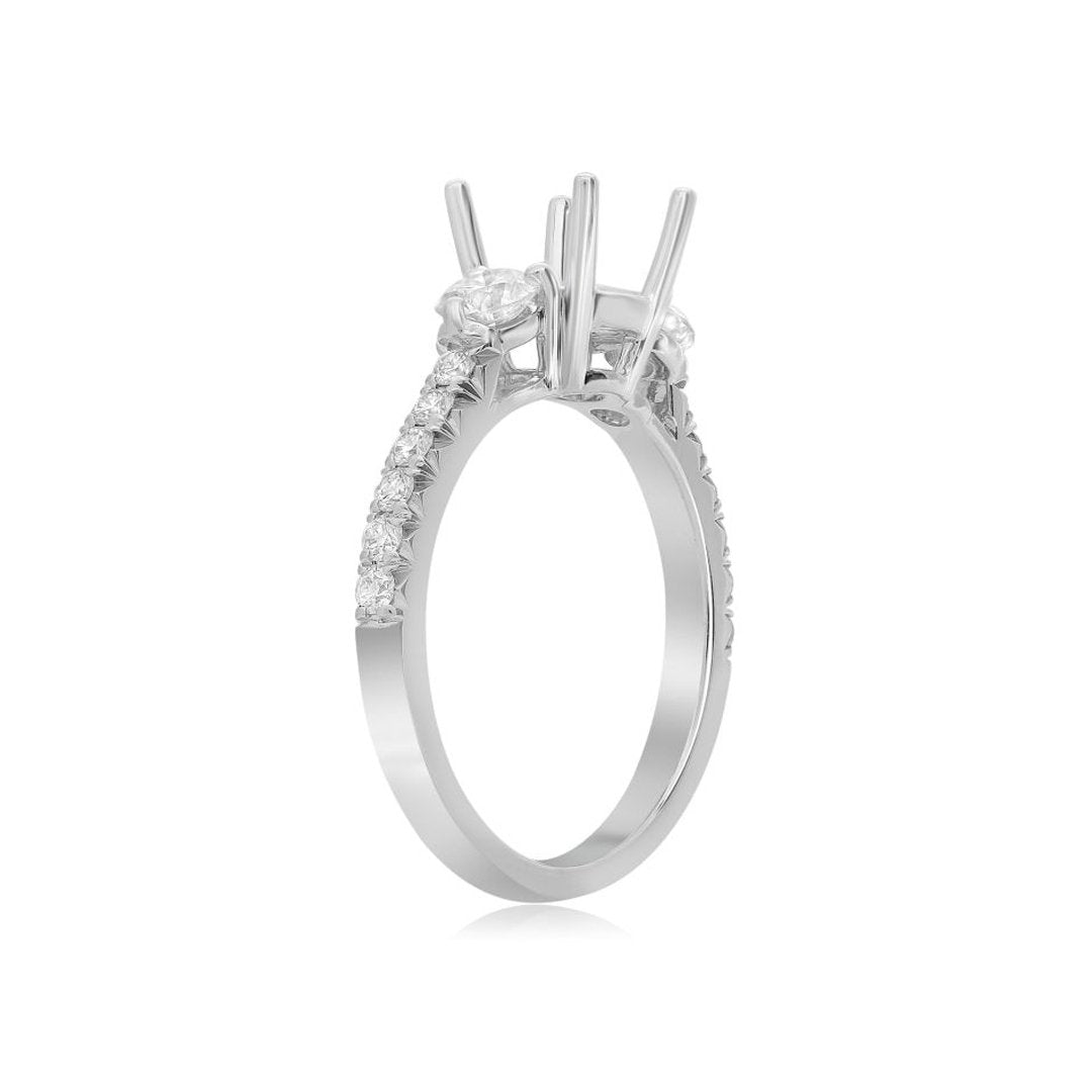 0.68 ctw Diamond Three-Stone Engagement Ring - Continental Diamond
