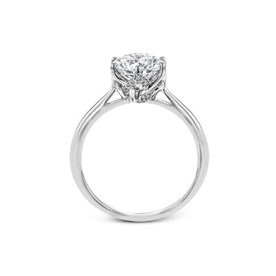 0.06 ctw Diamond Solitaire Engagement Ring - Continental Diamond
