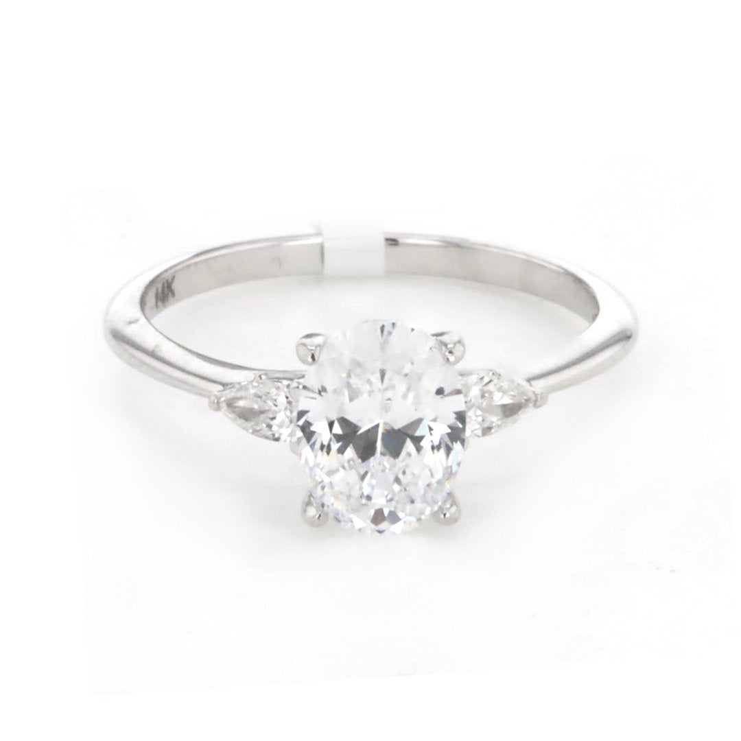 0.16 ctw Diamond Three-Stone Engagement Ring - Continental Diamond