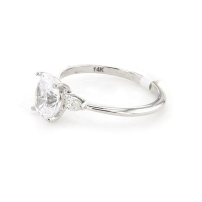0.16 ctw Diamond Three-Stone Engagement Ring - Continental Diamond