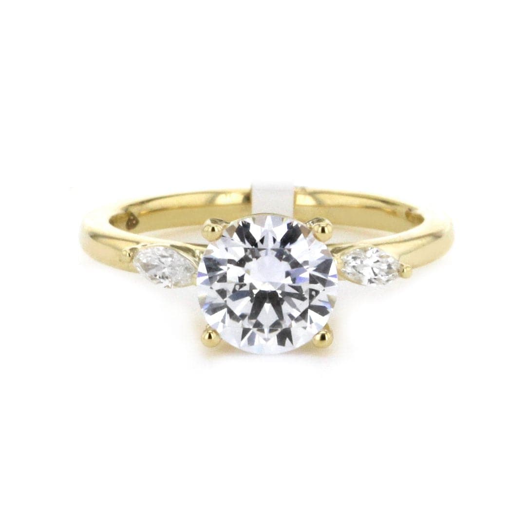 0.15 ctw Diamond Three-Stone Engagement Ring - Continental Diamond