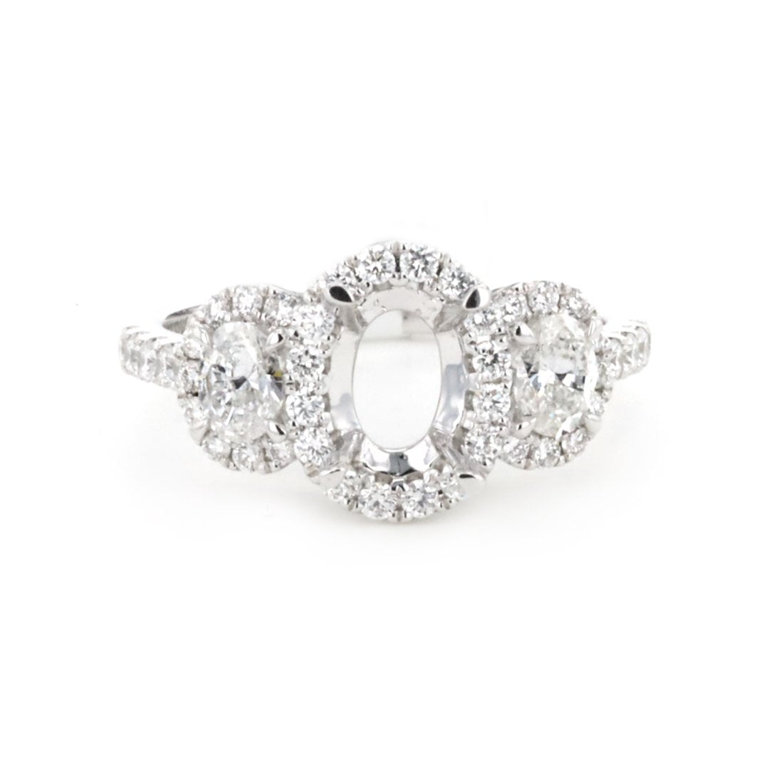 0.88 ctw Diamond Three-Stone Engagement Ring - Continental Diamond