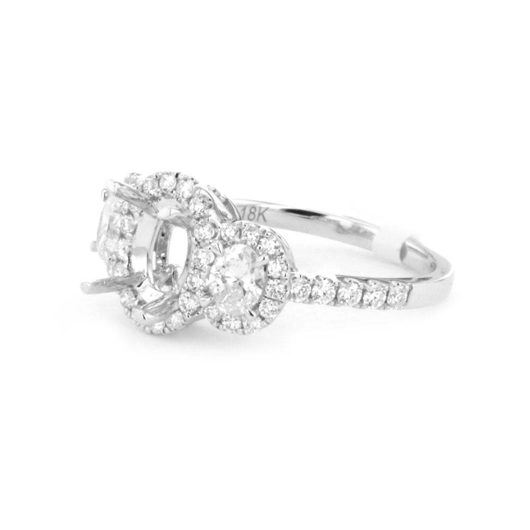 0.88 ctw Diamond Three-Stone Engagement Ring - Continental Diamond