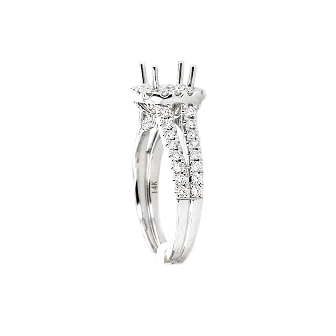 0.66 ctw Diamond Halo Engagement Ring - Continental Diamond