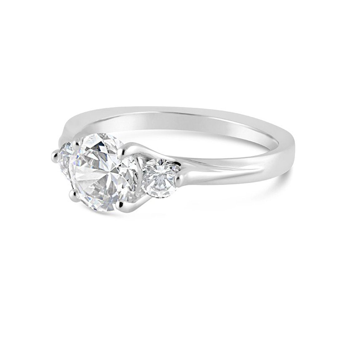 0.20 ctw Diamond Three-Stone Engagement Ring - Continental Diamond