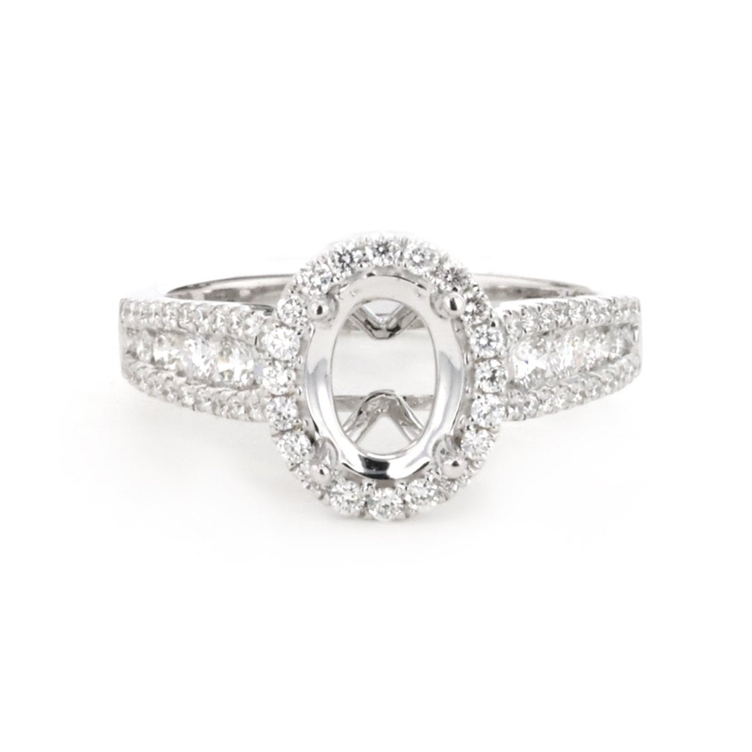 0.67 ctw Diamond Halo Engagement Ring - Continental Diamond