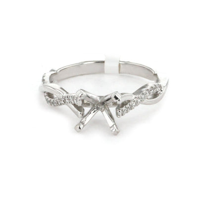 0.11 ctw Diamond Twist Engagement Ring - Continental Diamond
